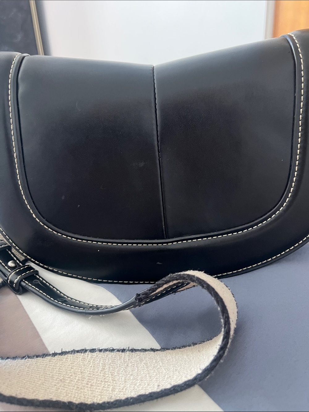 Black Curved Saddle Shoulder Bag with Contrast Stitching